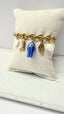 Bracelet Capri – Charms marins dorés et céramique bleue