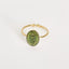 Bague ajustable dorée avec médaillon gravé motifs feuillage, Élégance intemporelle.