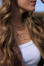 Collier Charlotte – Breloques fleuries, pierre de soleil et perles