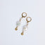 Boucles d’oreilles Estelle – Perles Keshi, quartz Herkimer et médaillon soleil