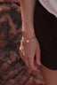 Bracelet Rosie – Breloques fleur, champignon et perle d’eau douce