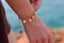 Bracelet Rosie – Breloques fleur, champignon et perle d’eau douce