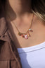 Collier Charlotte – Breloques fleuries, pierre de soleil et perles