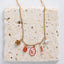 Collier Charlotte – Breloques fleuries, pierre de soleil et perles