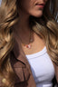 Collier Charlotte – Breloques fleuries, pierre de soleil et perles