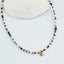 Collier Viola – Perles naturelles violettes et pendentif doré bohème chic