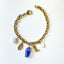 Bracelet Capri – Charms marins dorés et céramique bleue