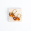 Boucles d’oreilles Lola Ambre – Pétales en résine