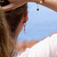 Boucles asymétriques Mariposa pierres de soleil