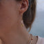 Boucles asymétriques Mariposa pierres de soleil