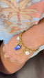 Bracelet Capri – Charms marins dorés et céramique bleue
