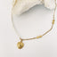 Collier Mila en acier inoxydable doré et perles de culture.