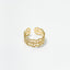 Bague en acier inoxydable doré avec motifs dentelle.