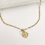 Collier Aya – Chaîne dorée & médaillon œil protecteur