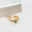 Bague en acier inoxydable doré avec pierre naturelle verte malachite.