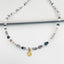 Collier Viola – Perles naturelles violettes et pendentif doré bohème chic