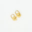 Boucles d’oreilles en acier inoxydable doré avec fleur effets nacre jaune.